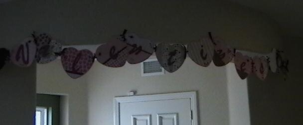 Second half of my &quot;Happy Valentine&#039;s Day&quot; banner hanging on the wall