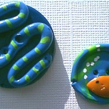 Glodfish and snake clay buttons