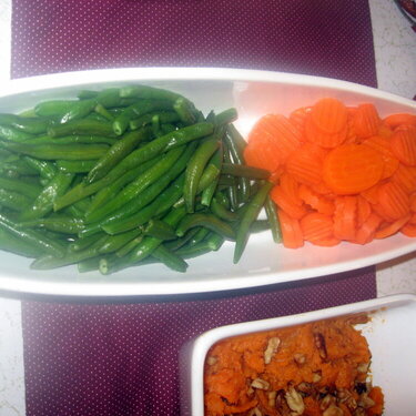 Cooked Carrots and Green Beans sauteed with butter and a few drops of truffle oil