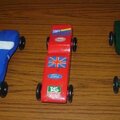 Three Pinewood Derby cars