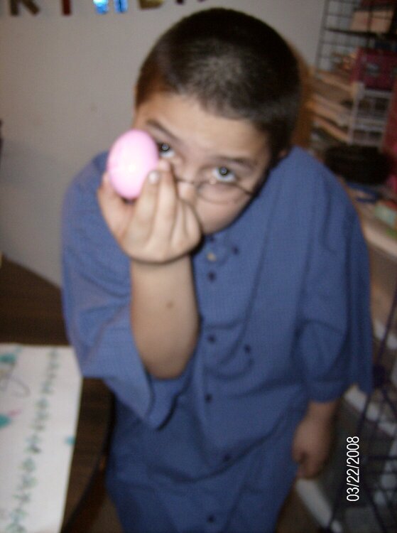 Jory Poses With an Egg