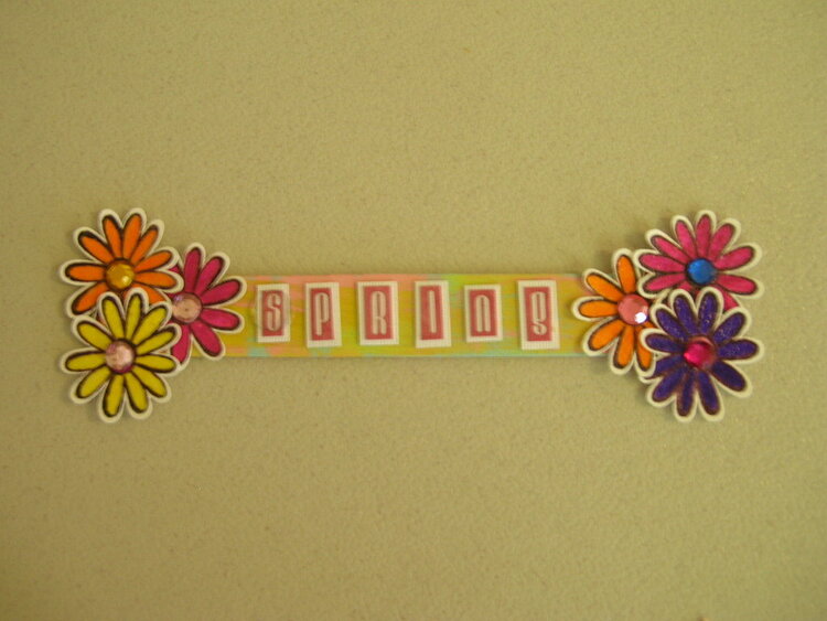 Spring altered popsicle stick