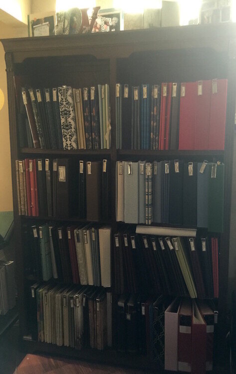 bookcase of scrapbooks