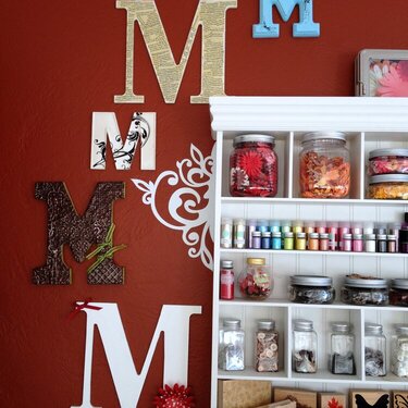 Monograms around shelves with vinyl accent close up.