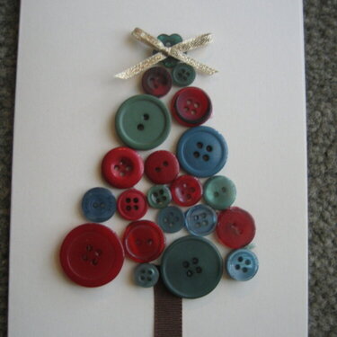 button tree with gold bow