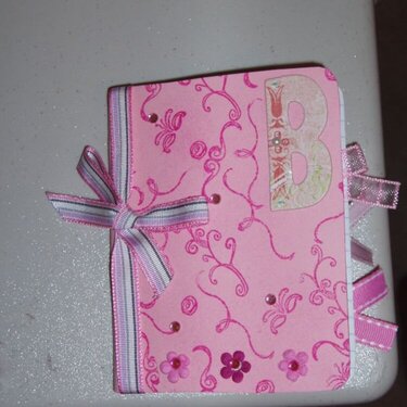 Altered mini composition book - pink front