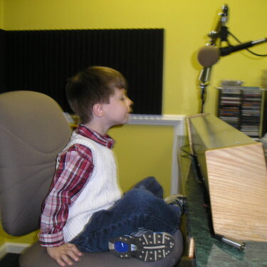 Matthew caroling at radio station