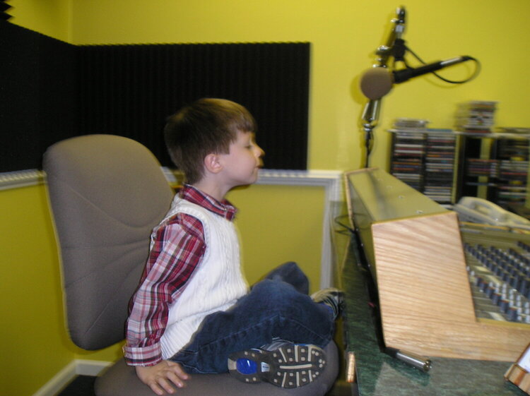 Matthew caroling at radio station