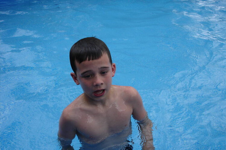Zac in their swimming pool