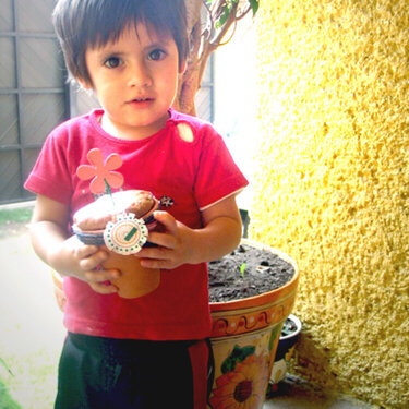 Diego with cupcake pot