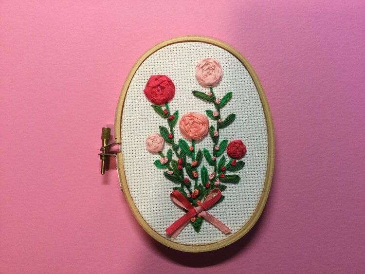 Embroidered roses in hoop
