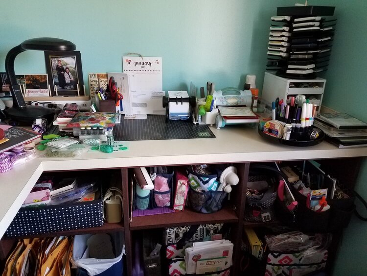 Stampin&#039; Up ink tower, craft lamp, stamp index, and work space on L-shape counter