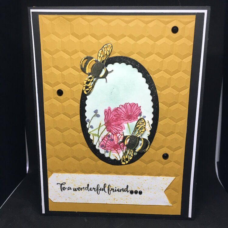 Bees and flowers I used yellow and black for the ffront. I cut and framed an oval and inset a flower garden type stamp design fo