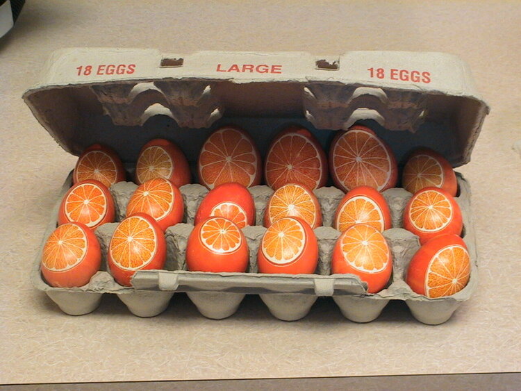 All my Orange Pysanky Eggs in one carton