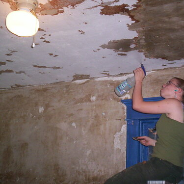 Amy Spraying the ceiling