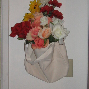 I had silk flowers and a canvas bag which both needed a home