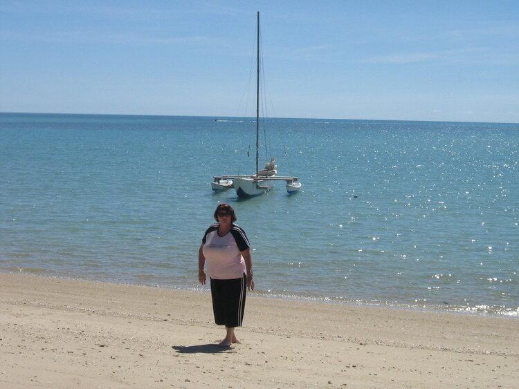 kathy walking on the sand