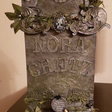 The tombstone of Nora Gretz (AKA No Regrets)