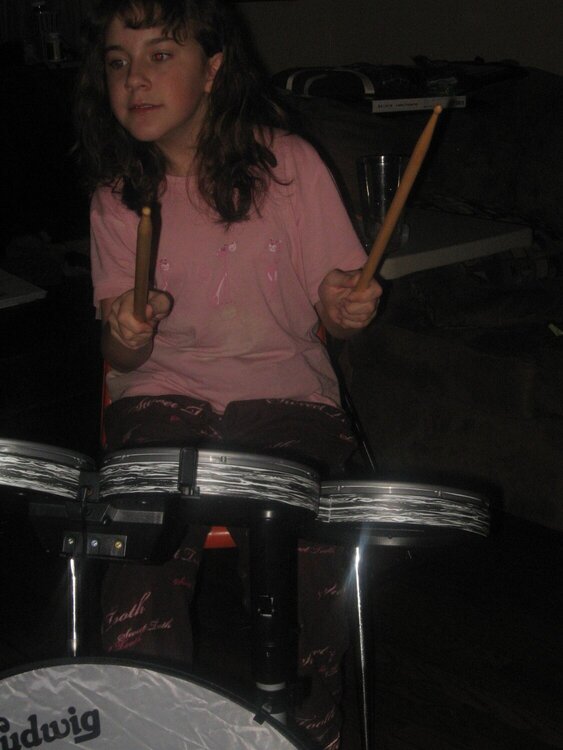 My daughter playing drums.