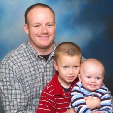 My husband dan with our two sons Caleb and Connor