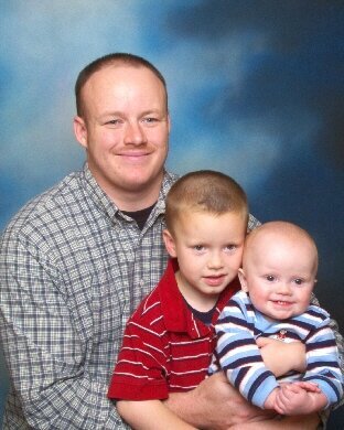 My husband dan with our two sons Caleb and Connor