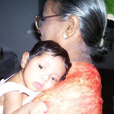 Tired Disha in paternal Granny&#039;s arms
