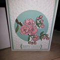 Simple embossed card stock with cut out flowers