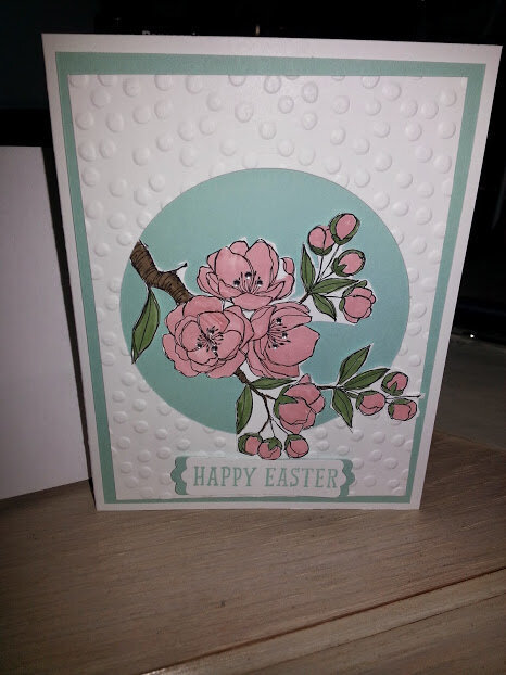 Simple embossed card stock with cut out flowers