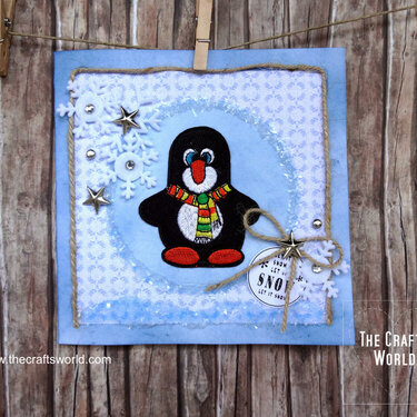 Christmas card with a penquin iron on patch