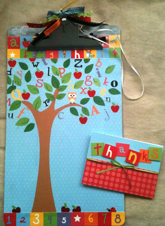 Clipboard and thank you card for a teacher
