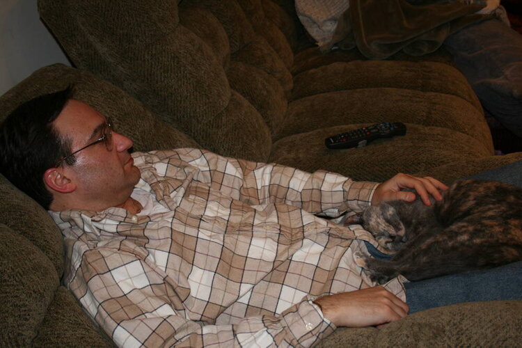 Jan 9 - Dad watching TV with Mudpie