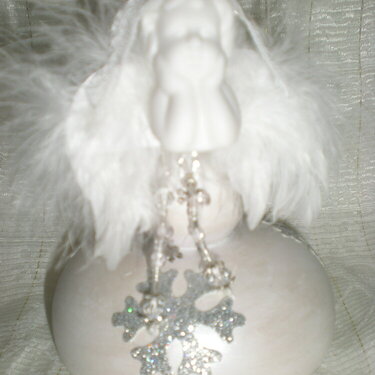 Altered candlestick (close-up on the little angel)