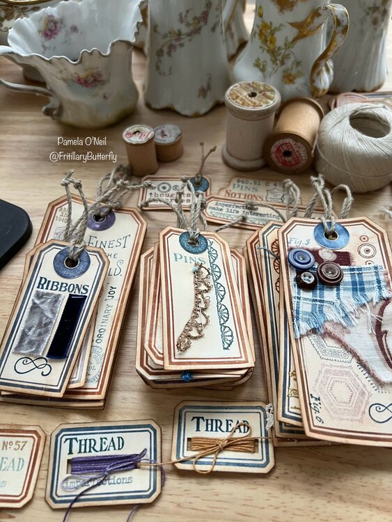 Stamped and embossed tags for treasured bits journal