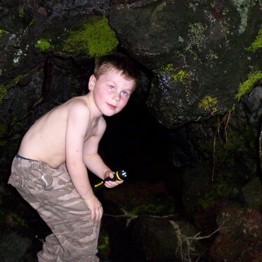 Jayden exploring Rangitoto&#039;s lava caves
