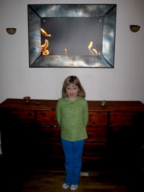 Anika in front of the fire place
