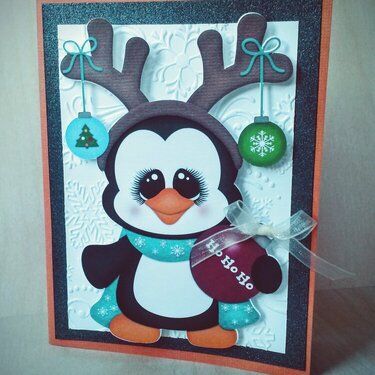 Penguin with reindeer disguise