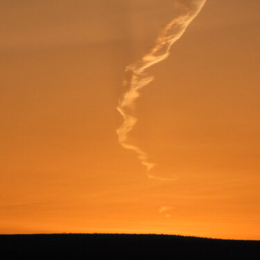 Sunset contrail