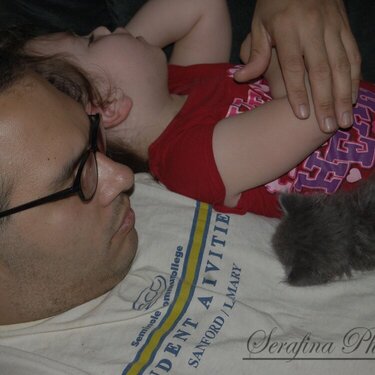 Nap time for hubby, tali and our new kitten, Laci.