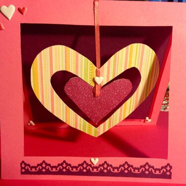 Valentine With Hanging Hearts in Window