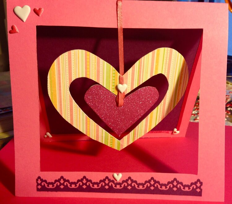 Valentine With Hanging Hearts in Window