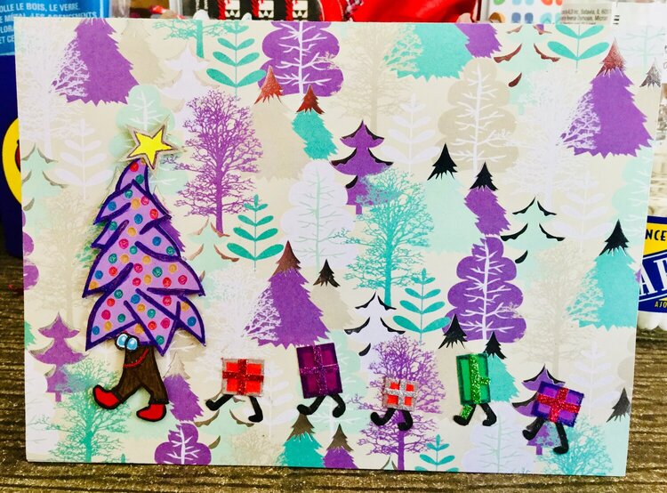 Front of Christmas Card With Walking Tree and Presents