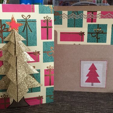 Christmas Tree of Gold with Gifts as Backdrop