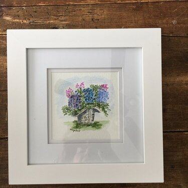 Framed AI watercolor.