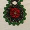 Closeup of Crochet Poinsettia Scarf with Prima Flower