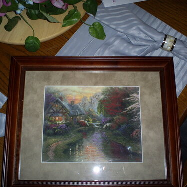 Framed Thomas Kinkade needlework. First time, took months but turned out beautiful