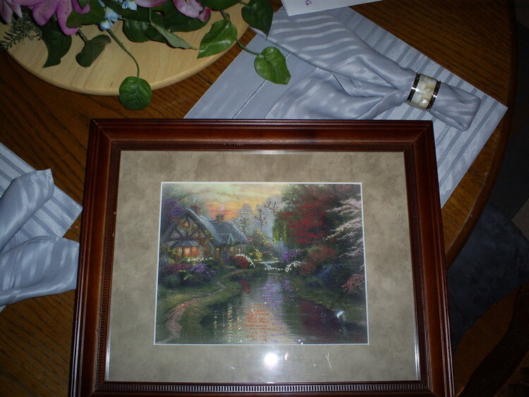 Framed Thomas Kinkade needlework. First time, took months but turned out beautiful