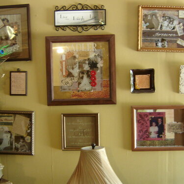 This is my whole wall of Scrapbook Frames of Our Family