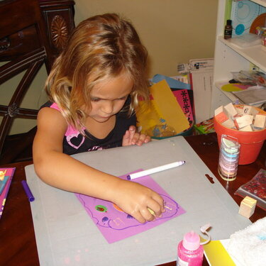 My dd making lo&#039;s for her scrapbook.