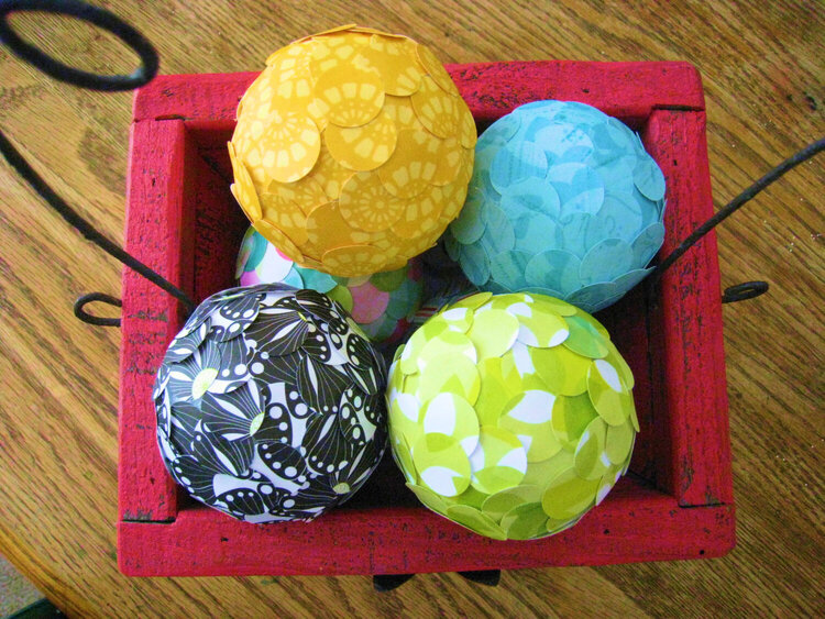 Paper covered syrofoam balls