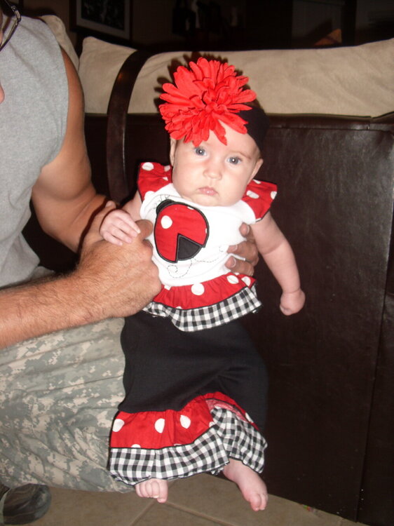 Landry strutting her pretty flower headband I made her!